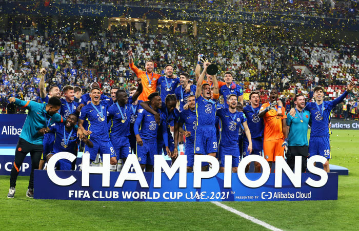 Chelsea players celebrate with the FIFA Club World Cup trophy